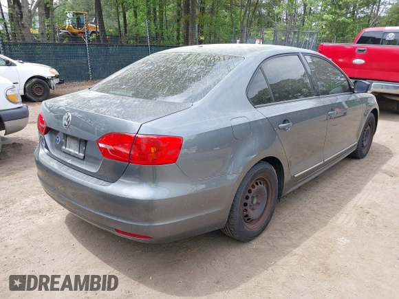 2014 Volkswagen Jetta Sedan S with VIN 3VW1K7AJ2EM371905, listed as a IAAI auction lot 42068276 with 198,419 mi miles. Bid and sale history available at carsss.com. Image 4.