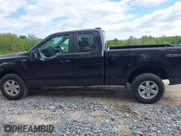 2023 Ford F-150 XL with VIN 1FTEX1EP8PKD51248, listed as a IAAI auction lot 42237097 with 90,886 mi miles and . Bid and sale history available at DreamBid. Image 14.