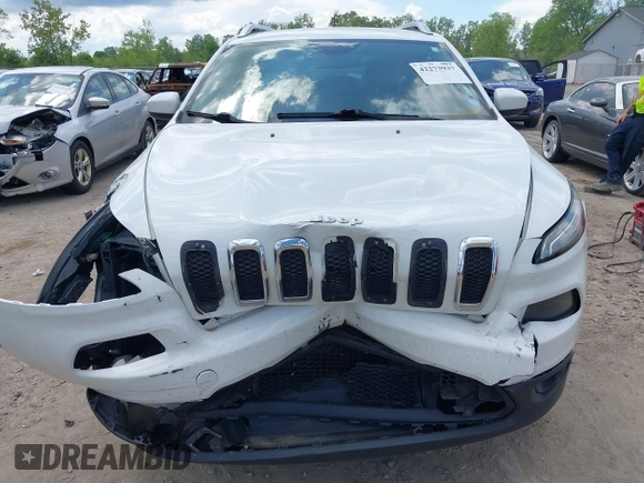 2015 Jeep Cherokee Latitude z VIN 1C4PJMCS3FW557734, wystawiony jako IAAI lot #42273937 z przebiegiem 168 828 mil mil oraz . Historia ofert i sprzedaży dostępna na DreamBid. Obrazek 12.