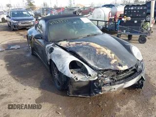2007 Porsche 911 Carrera S z VIN WP0CB299X7S777014, wystawiony jako IAAI lot #41463577 z przebiegiem Nie podano mil oraz . Historia ofert i sprzedaży dostępna na DreamBid. Obrazek 6.