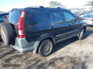 2006 Honda CR-V LX with VIN SHSRD68516U400389, listed as a IAAI auction lot 42005508 with 209,822 mi miles. Bid and sale history available at carsss.com. Image 4.