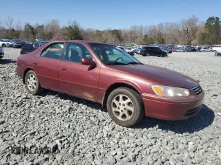 2000 Toyota Camry CE z VIN 4T1BG22K4YU645684, wystawiony jako Copart lot #50883715 z przebiegiem 263 664 mil mil oraz Szkoda całkowita • Salvage title. Historia ofert i sprzedaży dostępna na DreamBid. Obrazek 4.