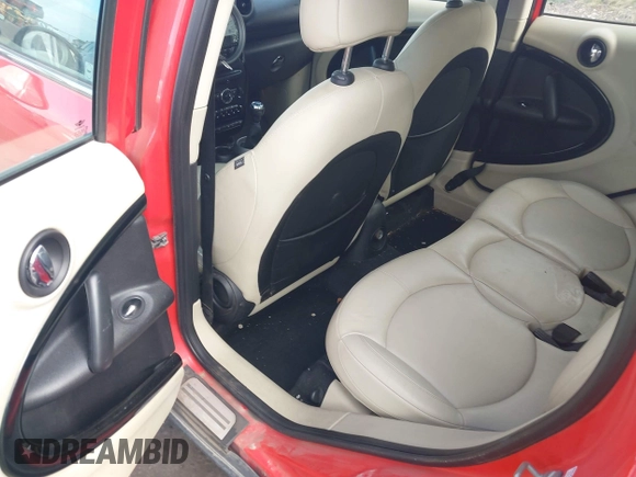 2012 MINI Countryman S with VIN WMWZC5C54CWM13041, listed as a IAAI auction lot 42244303 with 139,733 mi miles and . Bid and sale history available at DreamBid. Image 8.