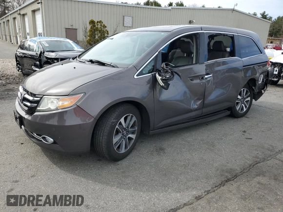 2015 Honda Odyssey Touring Elite with VIN 5FNRL5H95FB117971, listed as a Copart auction lot 52083475 with 82,626 mi miles and Salvage Title. Bid and sale history available at DreamBid. Image 1.