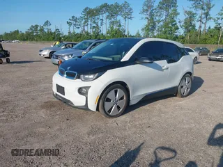 2015 BMW i3 with VIN WBY1Z4C59FV503755, listed as a IAAI auction lot 42589069 with 87,470 mi miles and . Bid and sale history available at DreamBid. Image 2.
