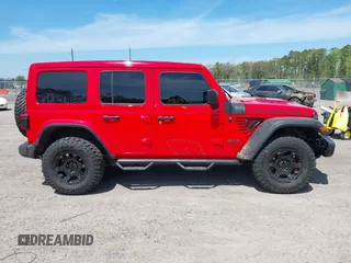 2020 Jeep Wrangler Unlimited Rubicon with VIN 1C4HJXFG9LW106607, listed as a IAAI auction lot 41908295 with 71,083 mi miles and . Bid and sale history available at DreamBid. Image 13.