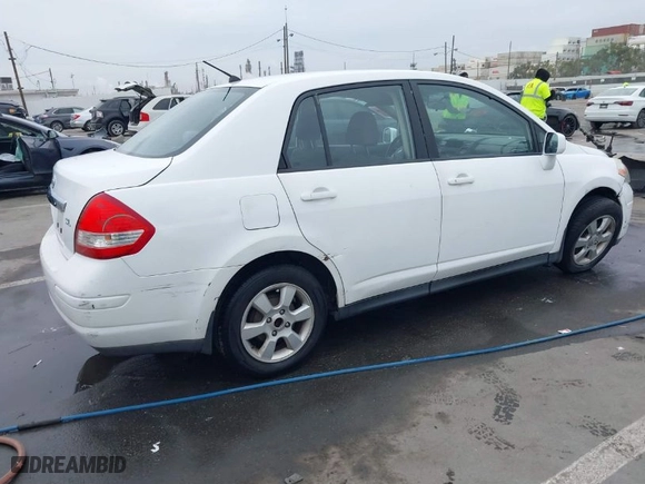 2010 Nissan Versa 1.8 S with VIN 3N1BC1AP2AL368284, listed as a IAAI auction lot 41720152 with 236,210 mi miles. Bid and sale history available at carsss.com. Image 4.
