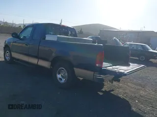 1999 Ford F-150 XL with VIN 1FTRX17L5XKB39130, listed as a IAAI auction lot 42041520 with Not Provided miles. Bid and sale history available at carsss.com. Image 3.