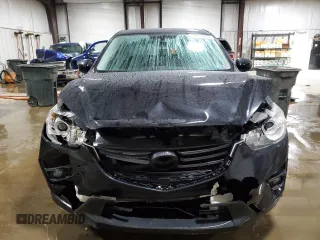 2016 Mazda CX-5 Touring with VIN JM3KE4CY0G0899611, listed as a Copart auction lot 52872915 with 76,801 mi miles and Salvage Title. Bid and sale history available at carsss.com. Image 5.