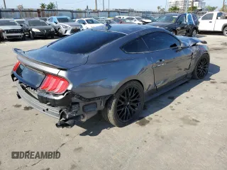2021 Ford Mustang GT z VIN 1FA6P8CF9M5103856, wystawiony jako Copart lot #56322045 z przebiegiem 27 499 mil mil oraz Szkody całkowita. Historia ofert i sprzedaży dostępna na DreamBid. Obrazek 3.