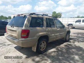 1999 Jeep Grand Cherokee Limited with VIN 1J4GW68S3XC580949, listed as a IAAI auction lot 42502949 with 150,520 mi miles and . Bid and sale history available at DreamBid. Image 4.