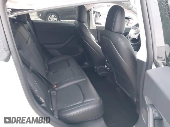 2021 Tesla Model Y Performance with VIN 5YJYGDEF6MF261711, listed as a IAAI auction lot 41176208 with 25,687 mi miles and . Bid and sale history available at DreamBid. Image 8.
