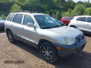2003 Hyundai Santa Fe GLS with VIN KM8SC13D23U365440, listed as a IAAI auction lot 42709820 with 209,864 mi miles and . Bid and sale history available at DreamBid. Image 1.