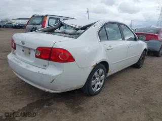 2008 Kia Optima LX with VIN KNAGE123585196316, listed as a IAAI auction lot 41853069 with 213,573 mi miles. Bid and sale history available at carsss.com. Image 4.