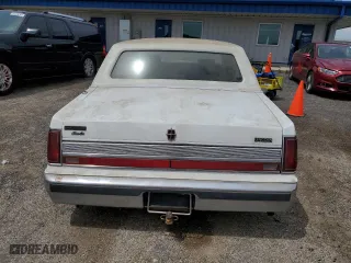 1989 Lincoln Town Car with VIN 1LNBM81F1KY658361, listed as a Copart auction lot 58558244 with 85,349 mi miles and Non Repairable. Bid and sale history available at carsss.com. Image 6.