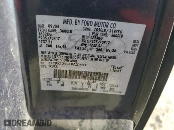 2004 Ford F-150 XL with VIN 1FTPX12534FA31237, listed as a Copart auction lot 58831324 with 301,271 mi miles and Non Repairable. Bid and sale history available at DreamBid. Image 13.