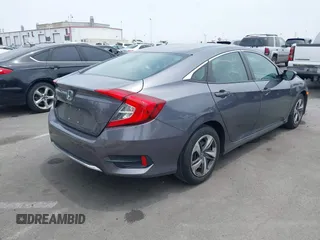 2020 Honda Civic LX z VIN 2HGFC2F60LH596396, wystawiony jako IAAI lot #42354812 z przebiegiem 62 082 mil mil oraz . Historia ofert i sprzedaży dostępna na DreamBid. Obrazek 4.