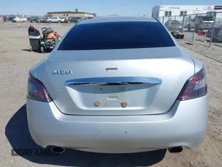2014 Nissan Maxima S z VIN 1N4AA5APXEC450907, wystawiony jako IAAI lot #41998184 z przebiegiem 186 314 mil mil oraz . Historia ofert i sprzedaży dostępna na DreamBid. Obrazek 16.