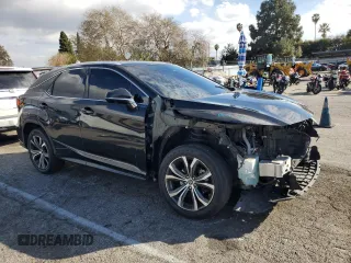 2021 Lexus RX with VIN 2T2HZMAA4MC206615, listed as a Copart auction lot 42412305 with 130,480 mi miles and Salvage Title. Bid and sale history available at carsss.com. Image 4.