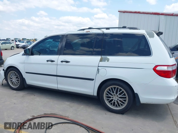2007 Honda Odyssey LX with VIN 5FNRL382X7B135892, listed as a IAAI auction lot 42223231 with 204,054 mi miles and . Bid and sale history available at DreamBid. Image 15.