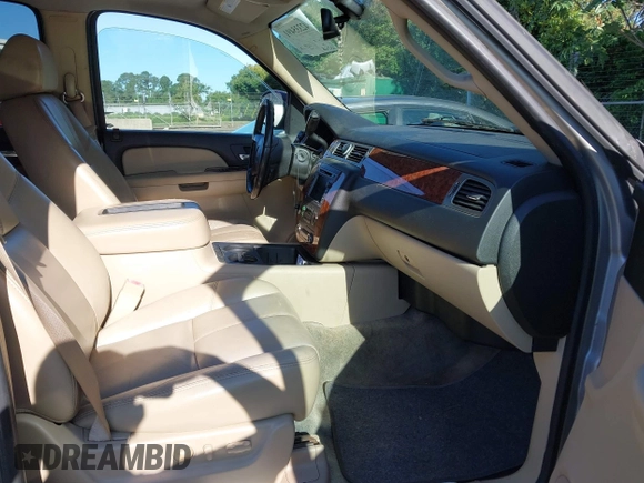 2007 Chevrolet Tahoe LT with VIN 1GNFK13097R174619, listed as a IAAI auction lot 42335491 with 207,265 mi miles and . Bid and sale history available at DreamBid. Image 5.