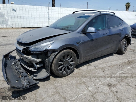 2021 Tesla Model Y Long Range with VIN 5YJYGDEEXMF070154, listed as a Copart auction lot 50742325 with 23,376 mi miles and Salvage Title. Bid and sale history available at carsss.com. Image 1.