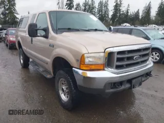 1999 Ford Super Duty F-250 XL with VIN 1FTNX21S6XEB53038, listed as a IAAI auction lot 41879644 with 214,226 mi miles. Bid and sale history available at carsss.com. Image 1.