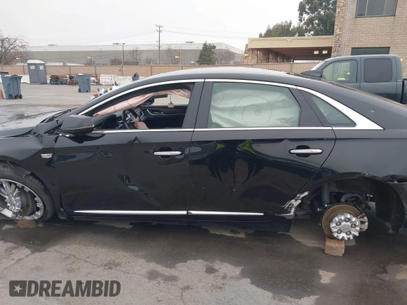 2018 Cadillac XTS Luxury with VIN 2G61M5S33J9119684, listed as a IAAI auction lot 41659807 with 107,156 mi miles and . Bid and sale history available at DreamBid. Image 13.