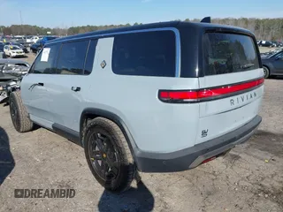 2024 Rivian R1S Adventure with VIN 7PDSGBBA8RN043516, listed as a IAAI auction lot 41675732 with 1 mi miles. Bid and sale history available at carsss.com. Image 3.