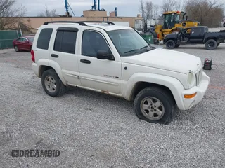 2002 Jeep Liberty Limited with VIN 1J4GL58K32W246480, listed as a IAAI auction lot 41832097 with 300,097 mi miles and . Bid and sale history available at carsss.com. Image 1.