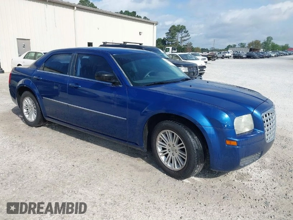 2009 Chrysler 300 LX with VIN 2C3KA43D69H614978, listed as a IAAI auction lot 41966879 with 247,871 mi miles. Bid and sale history available at carsss.com. Image 1.