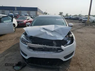 2016 Ford Focus SE with VIN 1FADP3F23GL404271, listed as a Copart auction lot 59134625 with 115,730 mi miles and Clean title. Bid and sale history available at DreamBid. Image 5.