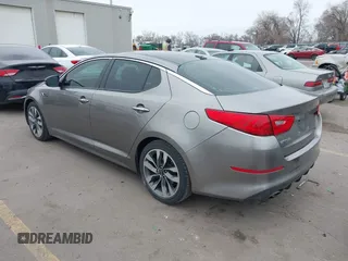 2014 Kia Optima SXL Turbo with VIN 5XXGR4A69EG312273, listed as a IAAI auction lot 41729863 with 107,660 mi miles and . Bid and sale history available at DreamBid. Image 3.
