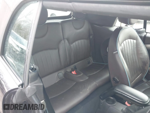2013 MINI Convertible S with VIN WMWZP3C54DT297304, listed as a IAAI auction lot 41377572 with 101,991 mi miles and . Bid and sale history available at DreamBid. Image 8.