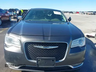2016 Chrysler 300 with VIN 2C3CCAEG0GH105650, listed as a IAAI auction lot 40853864 with 156,445 mi miles. Bid and sale history available at carsss.com. Image 13.