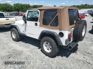 2004 Jeep Wrangler Sport with VIN 1J4FA49S94P751849, listed as a Copart auction lot 55519445 with 139,854 mi miles and Salvage title. Bid and sale history available at DreamBid. Image 2.