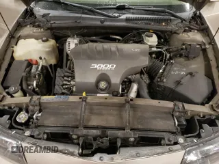2002 Pontiac Bonneville SLE z VIN 1G2HY54K124211759, wystawiony jako Copart lot #54573555 z przebiegiem 106 409 mil mil oraz Szkoda całkowita • Salvage title. Historia ofert i sprzedaży dostępna na DreamBid. Obrazek 11.