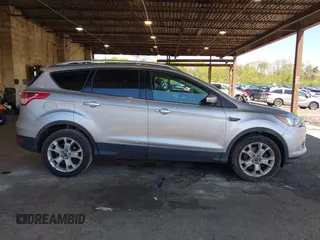 2016 Ford Escape Titanium с VIN 1FMCU9JX3GUB75889, выставлен на аукционе IAAI как лот 42188565 с пробегом 121 638 миль миль и . История ставок и продаж доступна на DreamBid. Изображение 13.