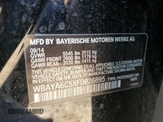 2015 BMW 7 Series 740i with VIN WBAYA6C5XFD826895, listed as a Copart auction lot 66889794 with Not Provided miles and Salvage Title. Bid and sale history available at DreamBid. Image 14.