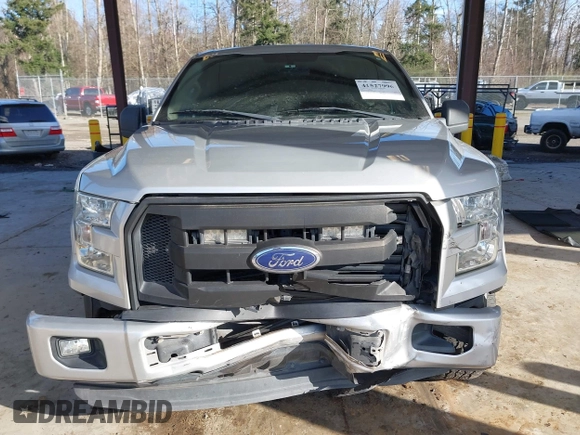 2015 Ford F-150 XLT with VIN 1FTEW1C86FKE85267, listed as a IAAI auction lot 41527996 with 119,800 mi miles and . Bid and sale history available at carsss.com. Image 12.