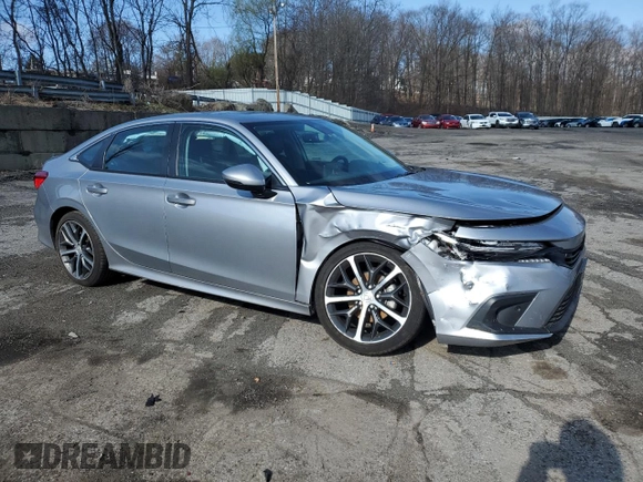 2023 Honda Civic Sedan Touring with VIN 2HGFE1F97PH305185, listed as a Copart auction lot 50556815 with 25,187 mi miles and Salvage Title. Bid and sale history available at carsss.com. Image 4.