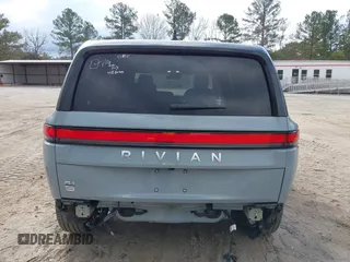 2024 Rivian R1S Adventure with VIN 7PDSGBBA1RN040036, listed as a IAAI auction lot 41694635 with 13,855 mi miles. Bid and sale history available at carsss.com. Image 17.