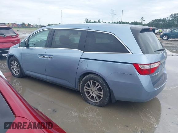2013 Honda Odyssey EX-L с VIN 5FNRL5H6XDB090432, выставлен на аукционе IAAI как лот 42468409 с пробегом Не указан миль и . История ставок и продаж доступна на DreamBid. Изображение 14.