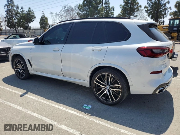 2019 BMW X5 xDrive40i with VIN 5UXCR6C57KLK85504, listed as a Copart auction lot 60908665 with 21,333 mi miles and Salvage title. Bid and sale history available at DreamBid. Image 2.