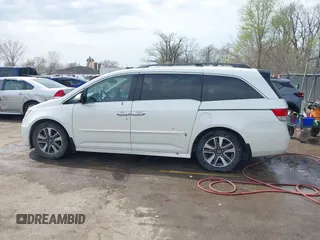 2014 Honda Odyssey Touring с VIN 5FNRL5H94EB057681, выставлен на аукционе IAAI как лот 41828000 с пробегом 249 350 миль миль и . История ставок и продаж доступна на DreamBid. Изображение 15.