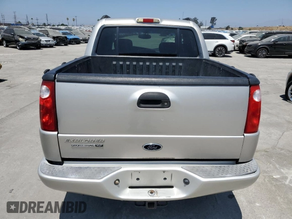 2004 Ford Explorer Sport Trac XLS with VIN 1FMZU67K34UA98361, listed as a Copart auction lot 66230905 with 228,461 mi miles and Clean title. Bid and sale history available at DreamBid. Image 6.