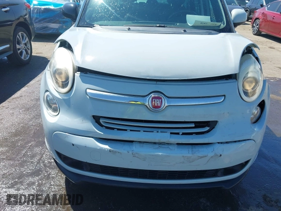 2015 FIAT 500L Easy with VIN ZFBCFABH8FZ031234, listed as a IAAI auction lot 41870102 with 86,267 mi miles and . Bid and sale history available at DreamBid. Image 6.