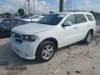 2013 Dodge Durango Crew with VIN 1C4RDHDGXDC608209, listed as a IAAI auction lot 42779231 with 203,460 mi miles and . Bid and sale history available at DreamBid. Image 2.