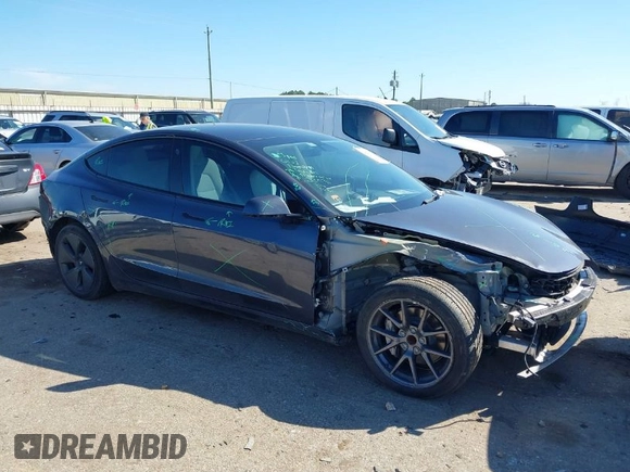 2022 Tesla Model 3 with VIN 5YJ3E1EAXNF326354, listed as a IAAI auction lot 41651872 with 27,922 mi miles and . Bid and sale history available at DreamBid. Image 1.