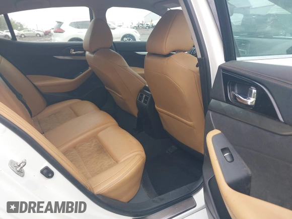 2016 Nissan Maxima SV z VIN 1N4AA6AP2GC401273, wystawiony jako IAAI lot #41898456 z przebiegiem 139 720 mil mil oraz . Historia ofert i sprzedaży dostępna na DreamBid. Obrazek 8.